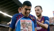 Barcelona's Uruguayan forward Luis Suarez celebrates a goal during the Spanish league football match between FC Barcelona and Real Madrid CF at the Camp Nou stadium in Barcelona on October 28, 2018. / AFP / Josep LAGO