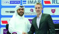 Qatar Squash Federation (QSF) Secretary-General Tariq Zainal (left) shaking hands with the Professional Squash Association (PSA) Chief Executive Alex Gough during a press conference held in Doha yesterday. Pic: Ibrahim Kutty