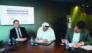 Yousuf Mohamed Al Jaida (centre), Chief Executive Officer of QFC; Wim De Waele (right), CEO and Managing Partner of B-Hive; and Dr Bart De Groof, Ambassador for Belgium to Qatar, during the signing ceremony.
