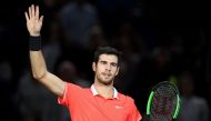 Russia's Karen Khachanov celebrates after winning against Austria's Dominic Thiem at the end of their men's singles semi-final tennis match on day six of the ATP World Tour Masters 1000 - Rolex Paris Masters - indoor tennis tournament at The AccorHotels A