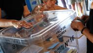 People cast their ballots for or against the independence of New Caledonia, November 4, 2018 in Noumea, New Caledonia.  / AFP / Theo Rouby