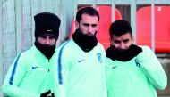 Atletico Madrid's French forward Antoine Griezmann, Atletico Madrid's Uruguayan defender Diego Godin and Atletico Madrid's Argentinian forward Angel Correa attend a training session at the Ciudad Deportiva Wanda training ground in Madrid on November 5, 20