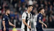 Juventus' Portuguese forward Cristiano Ronaldo reacts at the end of the UEFA Champions League group H football match Juventus vs Manchester United at the Allianz stadium in Turin on November 7, 2018. / AFP / Marco BERTORELLO