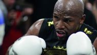 In this file photo taken on August 10, 2017 Boxer Floyd Mayweather Jr. goes through moves during a media workout at the Mayweather Boxing Club in Las Vegas, Nevada.  AFP / John Gurzinski
