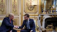 U.S. President Donald Trump and French President Emmanuel Macron shake hands during a meeting at Elysee presidential palace, as part of the commemoration ceremony for Armistice Day, 100 years after the end of the First World War, in Paris, France, Novembe