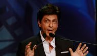 Indian Bollywood actor Shah Rukh Khan speaks during the inauguration of the 24th Kolkata International Film Festival in Kolkata on November 10, 2018. More than 320 films from 70 countries will be screened during the seven-day festival. / AFP / Dibyangshu 