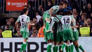 Betis players celebrate a goal during the Spanish league football match between FC Barcelona and Real Betis at the Camp Nou stadium in Barcelona on November 11, 2018. / AFP / Josep LAGO