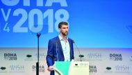 American swimming legend Michael Phelps addressing the World Innovation Summit for Health (WISH) at the  Qatar National Convention Center in Doha yesterday.