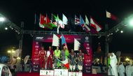 The podium winners of the 2018 Manateq International Rally of Qatar, celebrate after the presentation ceremony at iconic Souq Waqif yesterday. 