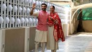 Indian Bollywood actors and recently-wedded couple Ranveer Singh (L) and Deepika Padukone pose after arriving at their residence in Mumbai on November 18, 2018, following their return from their nuptials at Italy's Lake Como. AFP 