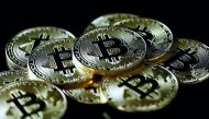 A collection of Bitcoin (virtual currency) tokens are displayed in this picture illustration taken December 8, 2017. Reuters/Benoit Tessier