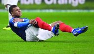 France's midfielder Kylian Mbappe (C) reacts after getting injured during the friendly football match France vs Uruguay, on November 20, 2018 at the Stade de France in Saint-Denis, outside Paris. AFP / Franck Fife