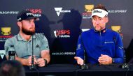 Team England's Tyrrell Hatton (L) and Ian Poulter speak during a press conference after a practice round at the World Cup of Golf in Melbourne on November 21, 2018. AFP / William West