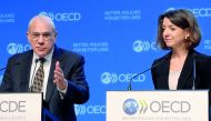 Secretary-General of the Organisation for Economic Co-operation and Development (OECD) Jose Angel Gurria (L) and New Chief Economist of the Organisation for Economic Co-operation and Development (OECD) Laurence Boone addresses a press conference to presen