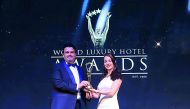 An official of Sealine Beach, a Murwab Resort receiving the award.