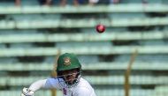 Bangladesh cricketer Mominul Haque plays a shot during the first day of the first Test cricket match between Bangladesh and West Indies at the Zahur Ahmed Chowdhury Stadium in Chittagong on November 22, 2018. AFP / Munir Uz Zaman
