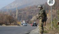 A member of the KFOR peacekeeping force patrols outside the village of Rudare near Mitrovica, Kosovo, November 23, 2018. Reuters/Laura Hasani
 