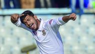 Bangladesh cricketer Nayeem Hasan celebrates after the dismissal of the West Indies cricketer Kemar Roach during the second day of the first Test cricket match between Bangladesh and West Indies at the Zahur Ahmed Chowdhury Stadium in Chittagong on Novemb