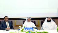 Faisal Saleh Al Mannai (centre), Head of Supervision and Control of Banks and other Financial Institutions Department at Qatar Central Bank (QCB), with other officials at the opening of the workshop organised by the QCB at Sharq Village and Spa in Doha ye
