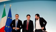 :FILE PHOTO: Italy's Minister of Labor and Industry Luigi Di Maio, Prime Minister Giuseppe Conte and Interior Minister Matteo Salvini leave at the end of a news conference after a cabinet meeting at Chigi Palace in Rome, Italy, October 20 2018. REUTERS/Re