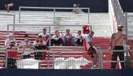 Supporters of River Plate are pictured at the Monumental stadium in Buenos Aires, after the all-Argentine Copa Libertadores second leg final match against Boca Juniors was postponed on November 25, 2018.  AFP / ALEJANDRO PAGNI