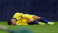 Chelsea's Eden Hazard reacts after sustaining an injury REUTERS/Phil Noble 