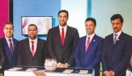 Officials at the QNB booth during the second student union forum in Los Angeles, California.