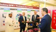 The senior officials of Qatar Mobility Innovations Center (QMIC) briefing about their digital solutions at the International Traffic Safety Conference & Exhibition in Doha.