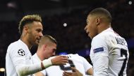 Paris Saint-Germain's Brazilian forward Neymar (L) celebrates with Paris Saint-Germain's French forward Kylian Mbappe (R) after scoring a goal during the UEFA Champions League Group C football match between Paris Saint-Germain (PSG) and Liverpool FC at th