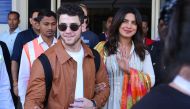 Indian actress Priyanka Chopra (R) and US musician Nick Jonas (centre L) arrive in Jodhpur in the western Indian state of Rajasthan on November 29, 2018. Chopra and Jonas are set to be married in a series of ceremonies in Jodhpur. AFP / Sunil Verma 