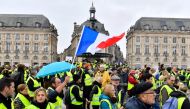 Yellow Vests (Gilets Jaunes in French) protesters demonstrate against rising oil prices and living costs in Bordeaux, southwestern France, on December 1, 2018. / AFP / NICOLAS TUCAT