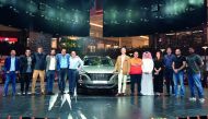 Officials pose for a group picture at the ceremony.