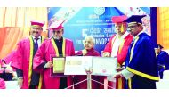 Dr. R Seetharaman, CEO of Doha Bank, with “Honor of the Doctoral Fellowship”.