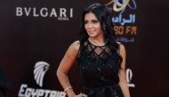 Egyptian actress Rania Youssef poses on the red carpet at the closing ceremony of the 40th edition of the Cairo International Film Festival (CIFF) at the Cairo Opera House in the Egyptian capital on November 29, 2018. / AFP / Suhail SALEH