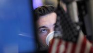A trader works on the floor at the New York Stock Exchange (NYSE) in New York City, U.S., November 30, 2018. REUTERS/Brendan McDermid