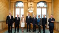 The newly elected Federal Councillors Karin Keller-Sutter (2nd-R), and Viola Amherd (3rd-R) pose with the Federal Council (from left) the Federal President Alain Berset, Federal Councillors Ueli Maurer, Simonetta Sommaruga, Guy Parmelin, Ignazio Cassis an