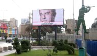 A billboard shows solidarity with Carlos Ghosn on a highway in Beirut, Lebanon December 4, 2018. REUTERS/ Mohamed Azakir