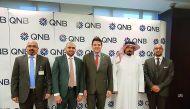 Senior officials of QNB and NCR Banking Services for Middle East and Africa at the launching ceremony in Qatar.