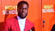 In this file photo taken on September 24, 2018 actor Kevin Hart arrives for the premiere of 'Night School' in Los Angeles, California.  / AFP / Frederic J. BROWN 