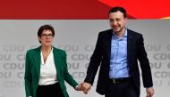 Newly-elected leader of the Germany's conservative Christian Democratic Union (CDU) party Annegret Kramp-Karrenbauer (L) congratulates Paul Ziemiak, leader of Christian Democratic Union (CDU) party's youth organisation (Junge Union) after his speech durin