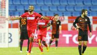 Al Arabi’s Qatari striker Fahad Al Balooshi (left) celebrates after scoring his second goal against Umm Salal during the QNB Stars League match played at the Al Gharafa Stadium yesterday.