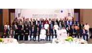 Top executives and senior employees of Ahlibank posing for a group photo to celebrate Qatar National Day and an award ceremony held to recognise its long-serving employees for their loyalty, commitment and dedication to the bank’s success, in Doha. 
