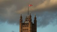 A Union flag flies from atop the Victoria Tower of the Palace of Westminster in central London, on December 7, 2018. AFP / Daniel LEAL-OLIVAS