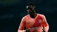 Barcelona's French forward Ousmane Dembele runs during the Spanish league football match RCD Espanyol against FC Barcelona at the RCDE Stadium in Cornella de Llobregat on December 8, 2018. / AFP / PAU BARRENA