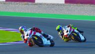 The defending Qatar Superstock 600 champion, Qatar’s Saeed Al Sulaiti (left) is closely followed by Abdulla Al Qubaisi during yesterday’s qualifying round at the Losail International Circuit.
