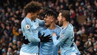 Manchester City's Brazilian striker Gabriel Jesus (C) celebrates scoring his team's first goal with Manchester City's German midfielder Leroy Sane (L) and Manchester City's Portuguese midfielder Bernardo Silva during the English Premier League football ma
