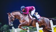 Mubarak Yousuf Al Rumaimi guides Vivaldi K over an obstacle during the Big Tour competition on the second day of fourth round of the Hathab Show Jumping Series at Qatar Equestrian Federation’s  (QEF) Outdoor Arena yesterday. 