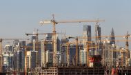 General view of Dubai's cranes at a construction site in Dubai, UAE December 18, 2018. (REUTERS/Satish Kumar)