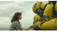 A still of Hailee Steinfeld and Bumblebee from the movie 