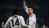 Juventus' French midfielder Blaise Matuidi (L) and Juventus' Portuguese forward Cristiano Ronaldo celebrate at the end of the Italian Serie A football match Torino vs Juventus on December 15, 2018 at the Olympic stadium in Turin. / AFP / Marco BERTORELLO